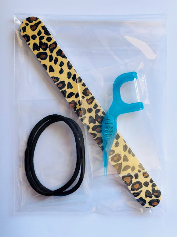 Nail file, 2  Hair Ties, 2 Tooth Piksters